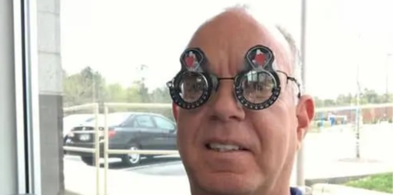 A man with an eye medical device.