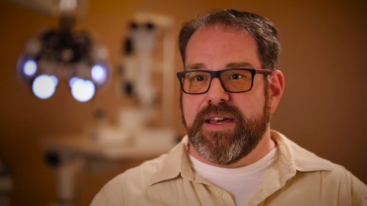 A man wearing glasses